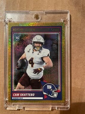 Score 2025 Cam Skattebo Rookie Trading Card - Gold Holo (numbered 297/499)
